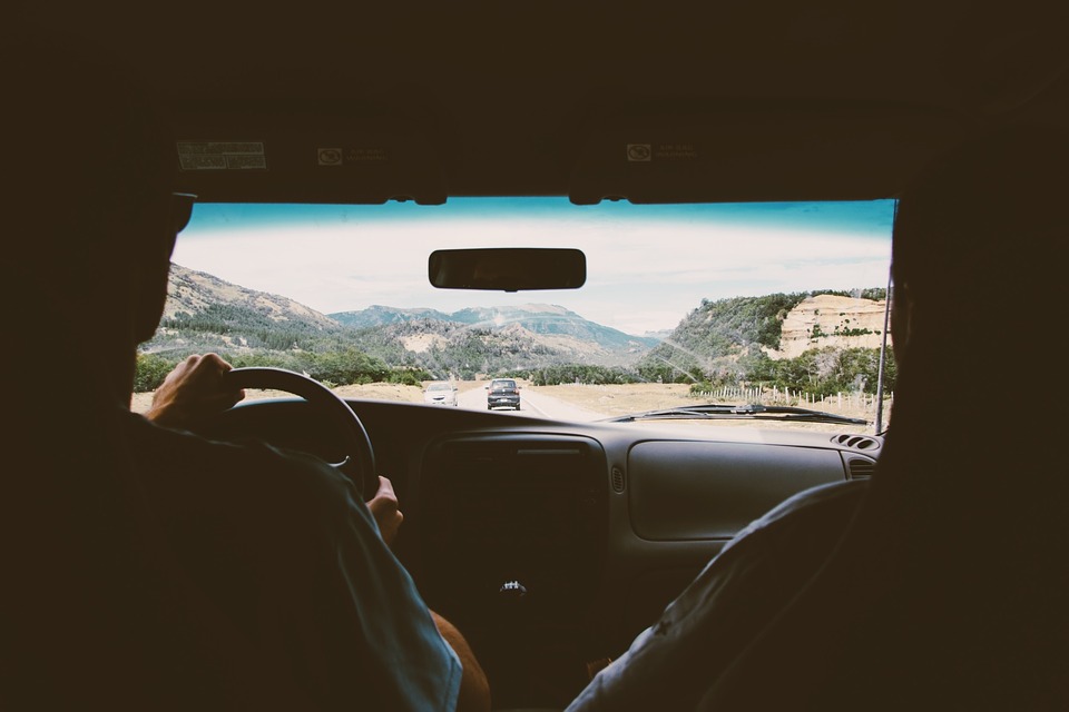 man and woman in car